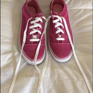 Vans magenta pink sneakers.